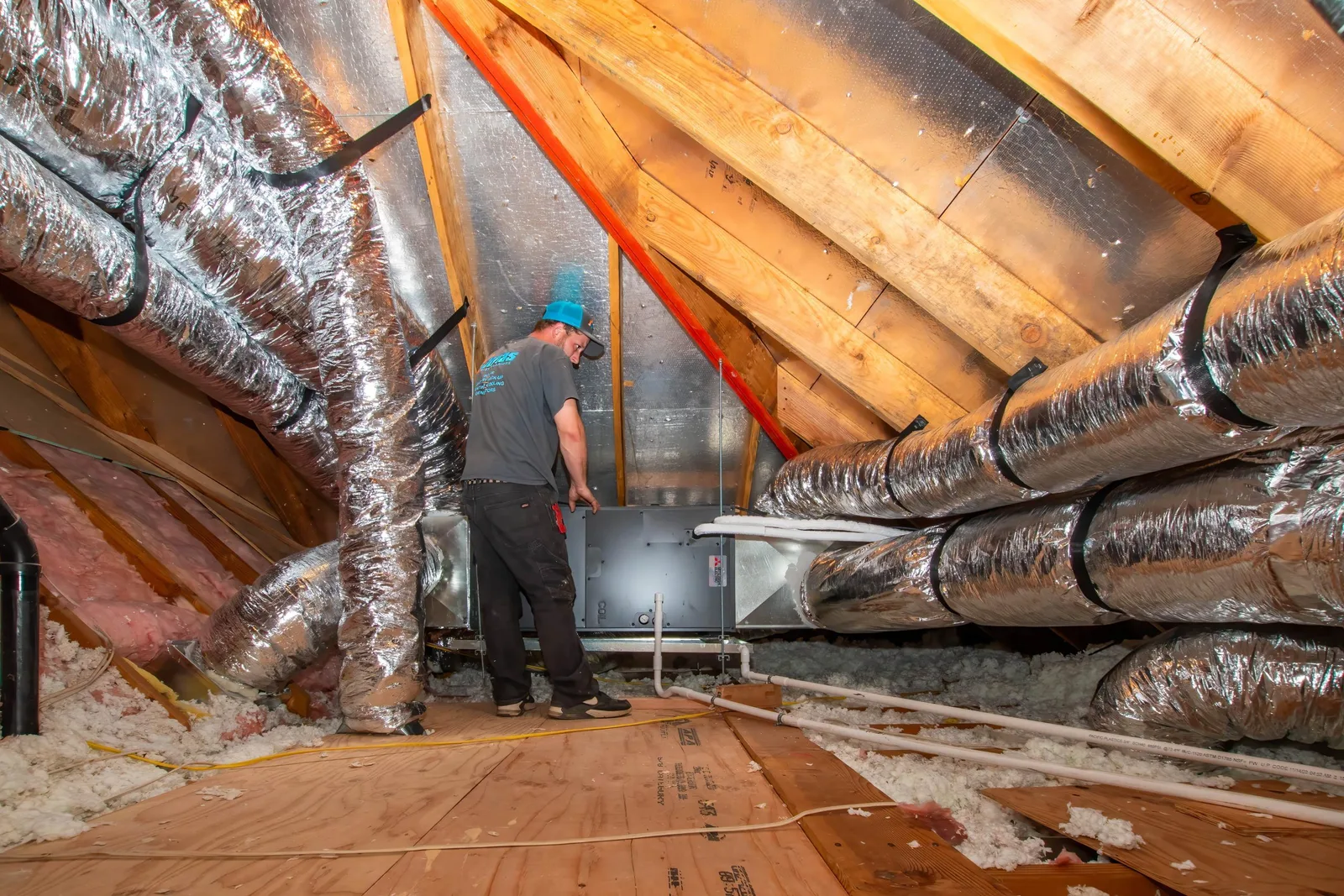Technician working on an air conditioning unit