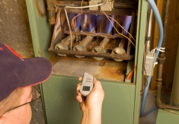 technician-working-inside-furnace